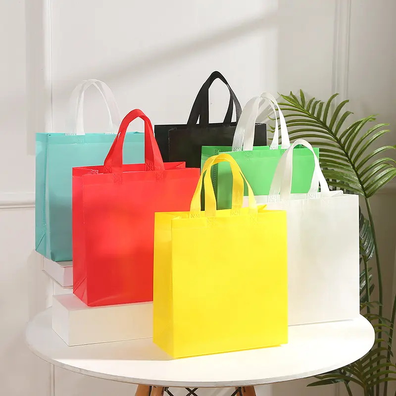 प्रचार पुनः प्रयोज्य टिकाऊ रंगीन खरीदारी गैर-बुना कपड़ा बैग हैंडल के साथ