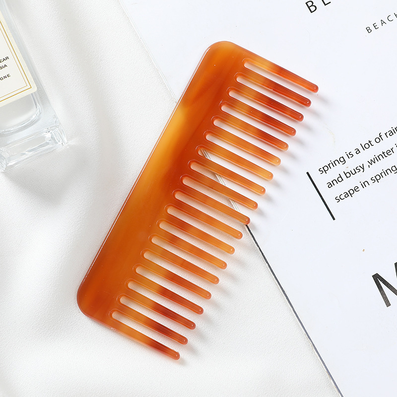 brown acetic acid hair comb