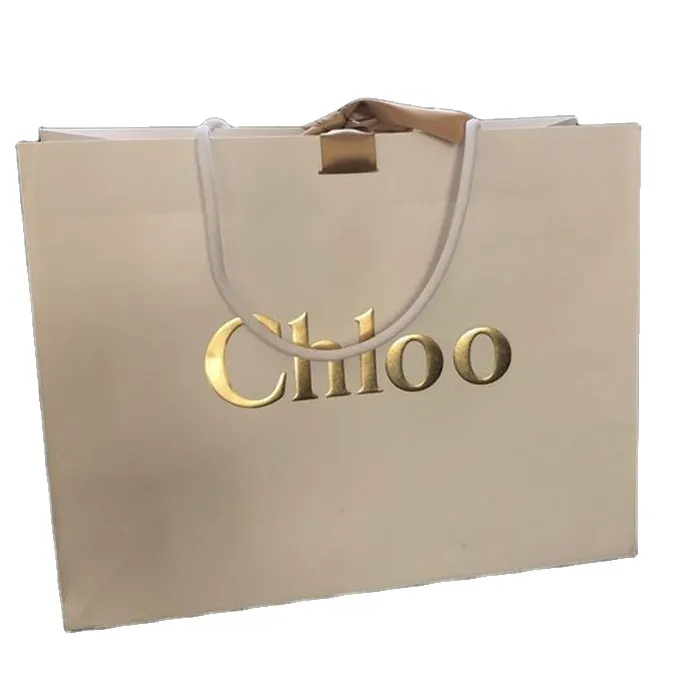 Sacchetto di carta per lo Shopping di imballaggi regalo con il proprio Design Logo personalizzato all'ingrosso pantaloni di carta fantasia di lusso OEM