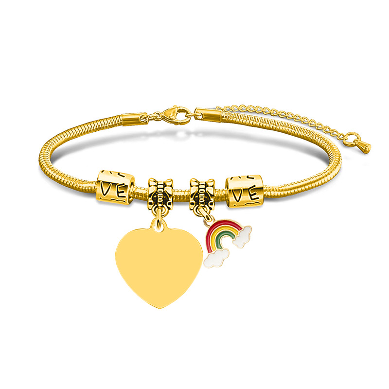 Corazón arco iris de oro