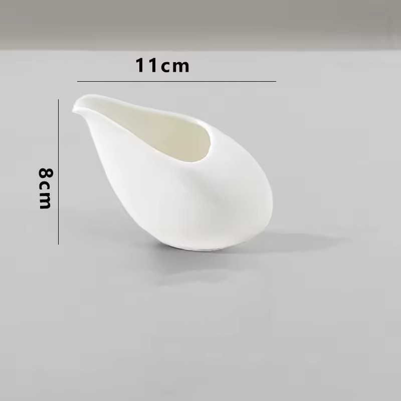 Cuillère à lait inclinée