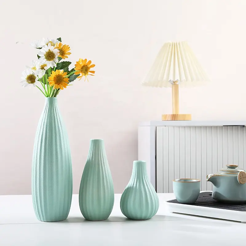 2023 vente chaude ensembles de vases en céramique avec rayure pour plantes artificielles vase à fleurs pièce centrale de mariage hôtel et décoration de la maison