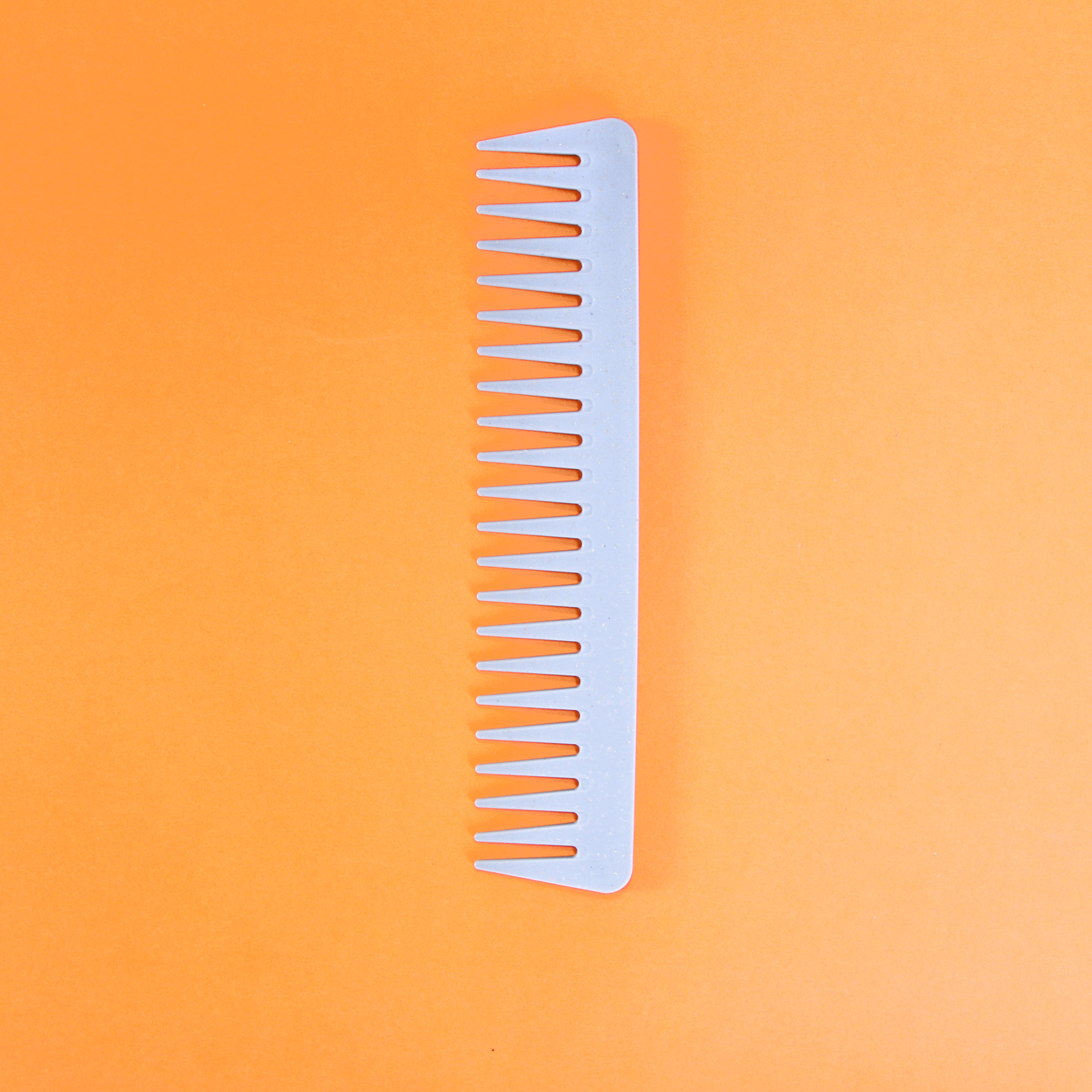 Silver-wide-tooth comb