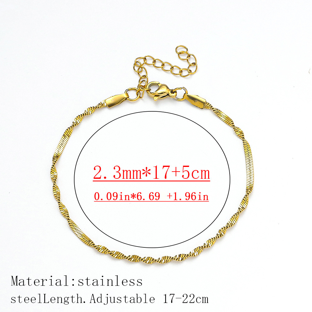 Pulsera retorcida - oro, 23 mm de ancho
