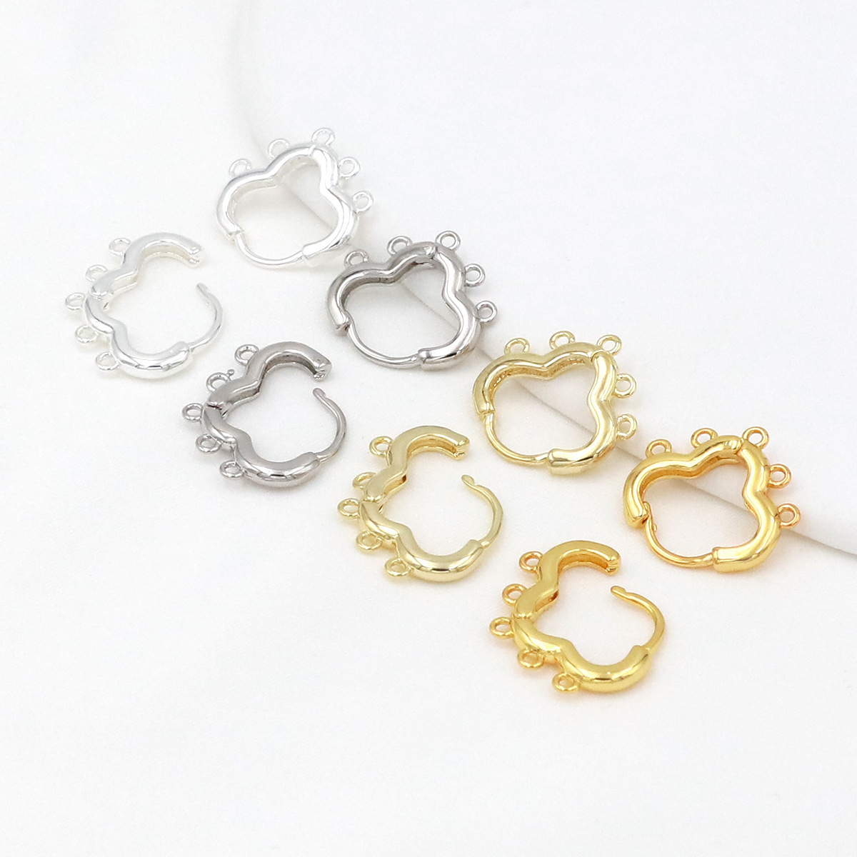 Cloud-shaped hoop earrings with five holes