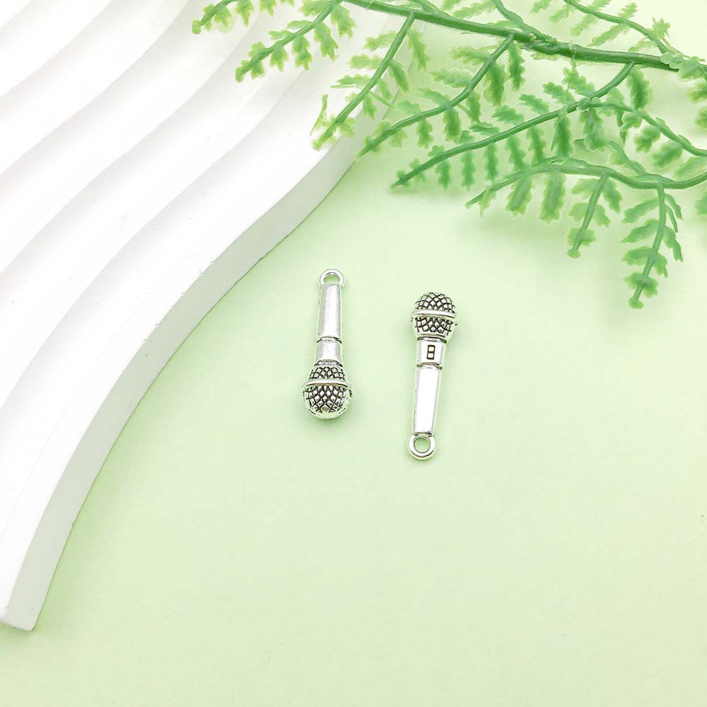1 microphone argent antique - 2,1g - 7*25mm - 9166
