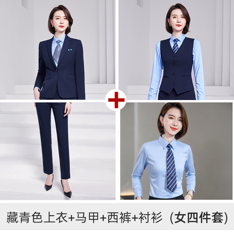 Women's navy blue suit, light blue shirt, vest, and trousers