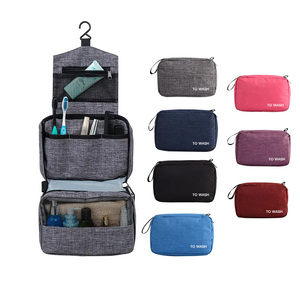 Pochette de toilette cosmétique pliable Ginzeal pochette de maquillage suspendue en <span class=keywords><strong>nylon</strong></span> imprimé de logo personnalisé sacs à cosmétiques pliants de voyage avec crochet
