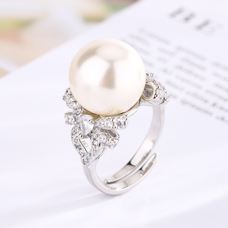 Bague perle blanche taille réglable