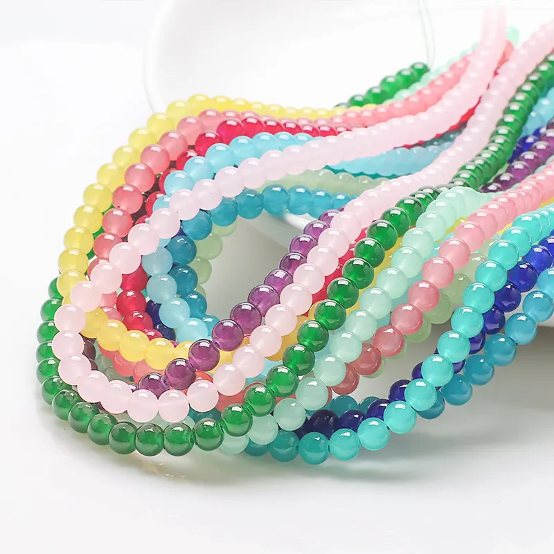 Vendita calda di alta qualità 8mm 10mm perle di giada di vetro 100 colori rotondi di cristallo di perle per la creazione di gioielli