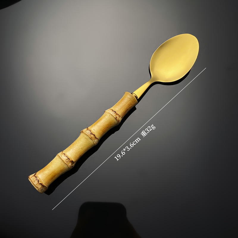 Golden tea spoon