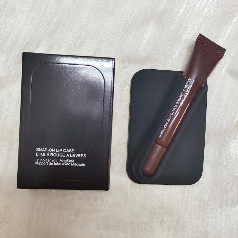 Black with lip gloss