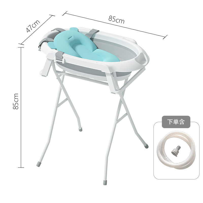 White stand + gray bath tub + blue bath mat