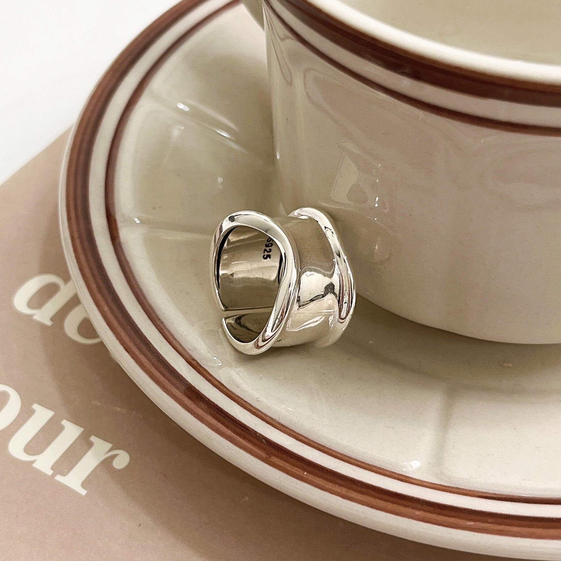 Wide-faced open ring