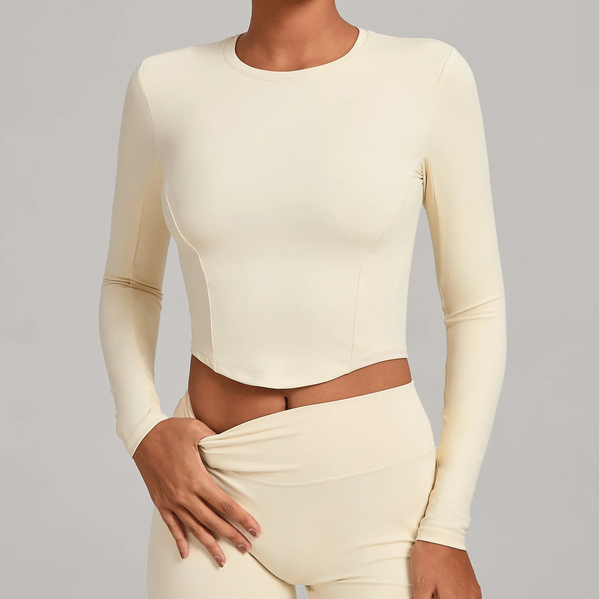 Tops beige de manga larga