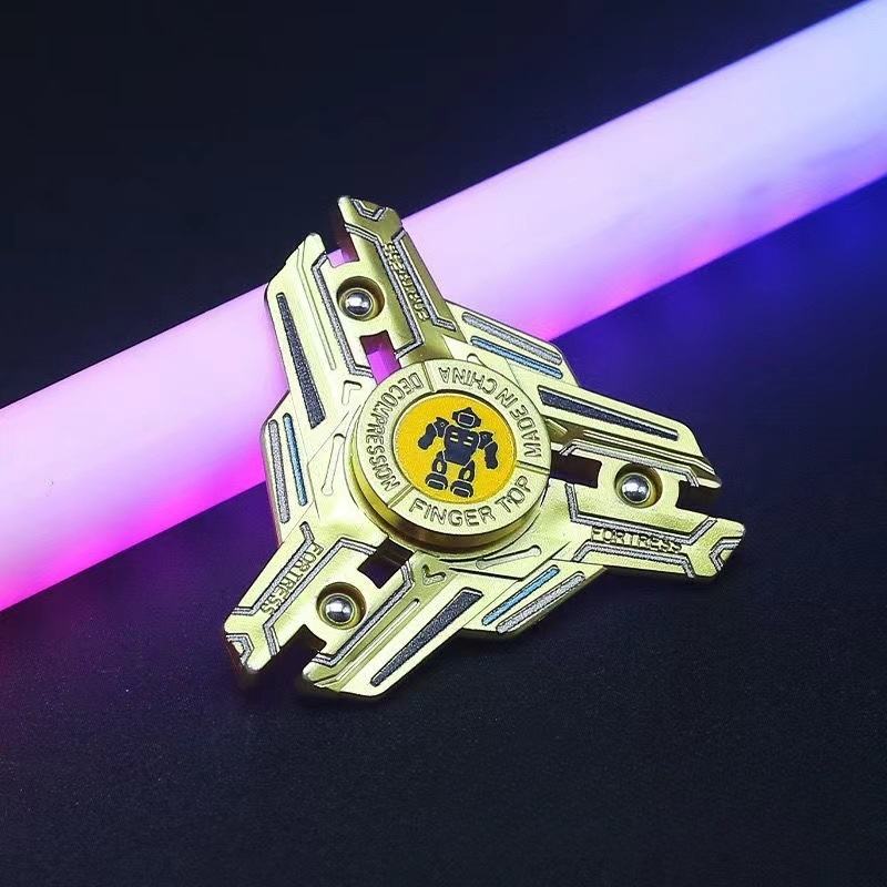 Three-leaf spinning top-gold