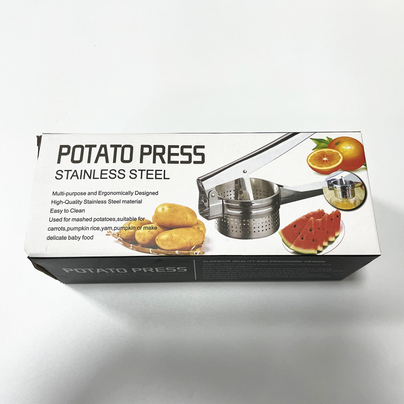 Exprimidor de frutas plateado