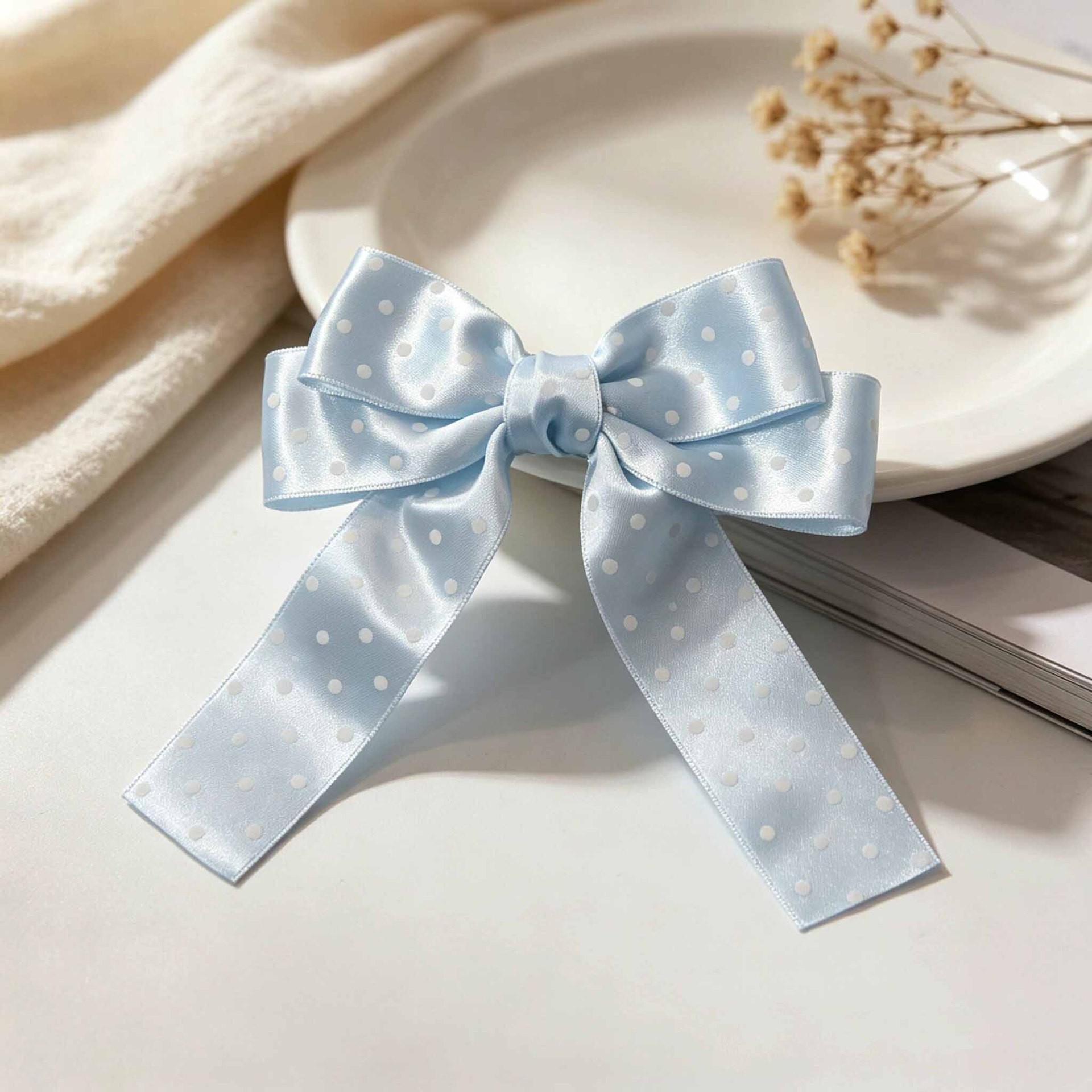Barrette à cheveux noeud à pois bleu