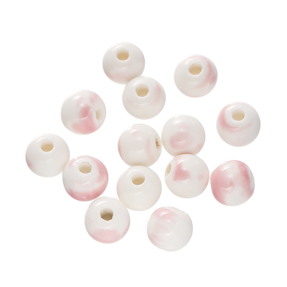 Perles en céramique - fleurs roses