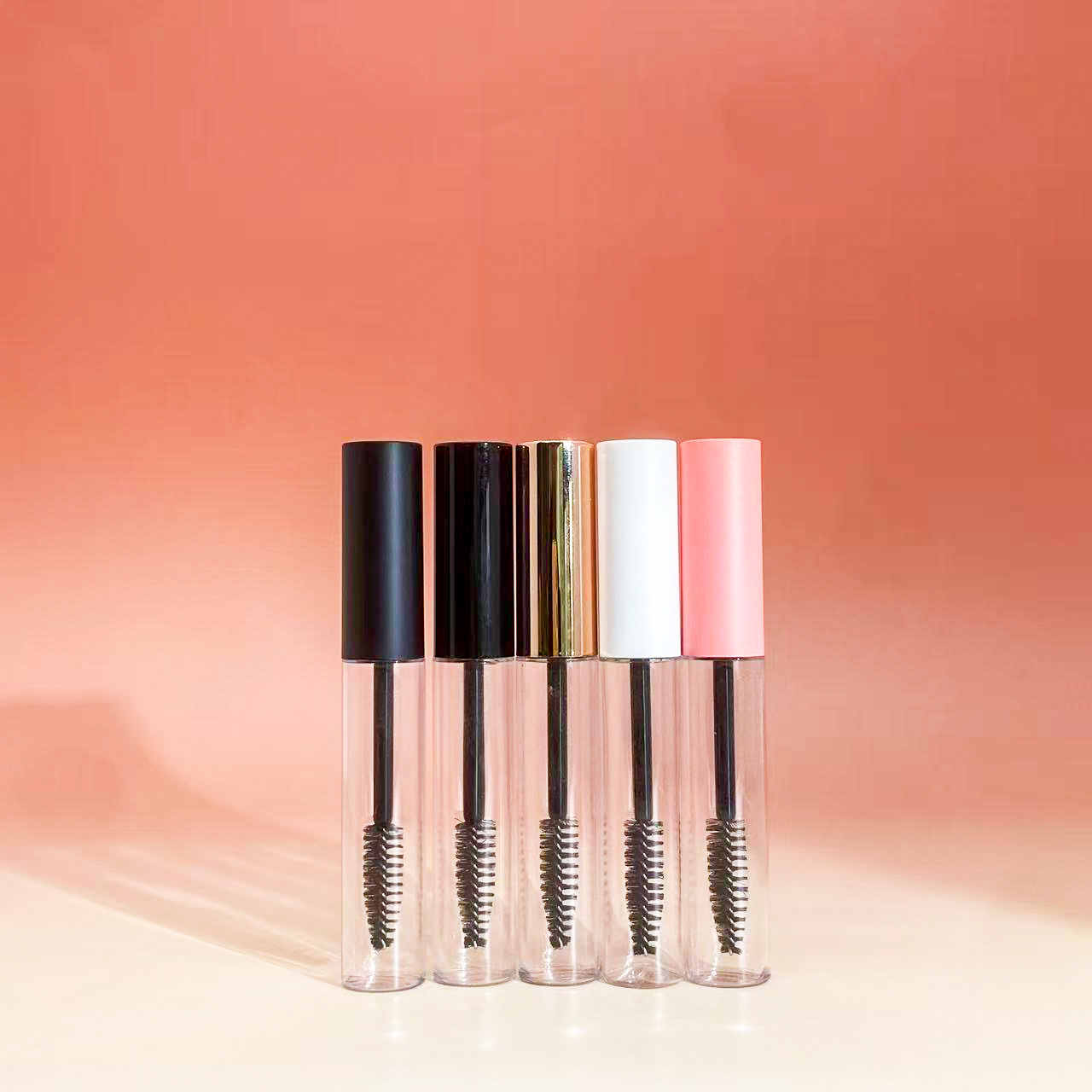 Bouchon rose, flacon transparent