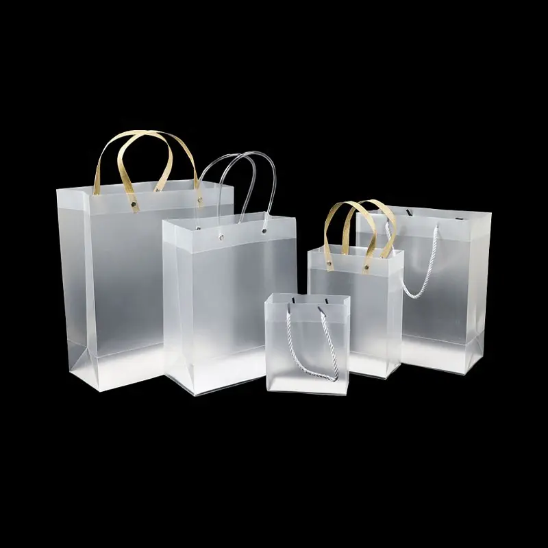 Bolsas de PP con cadena de tela con mango de fácil apertura transparente para regalos de devolución ropa de niña bolsa de ropa mango de cuerda de PP de viaje contra el polvo