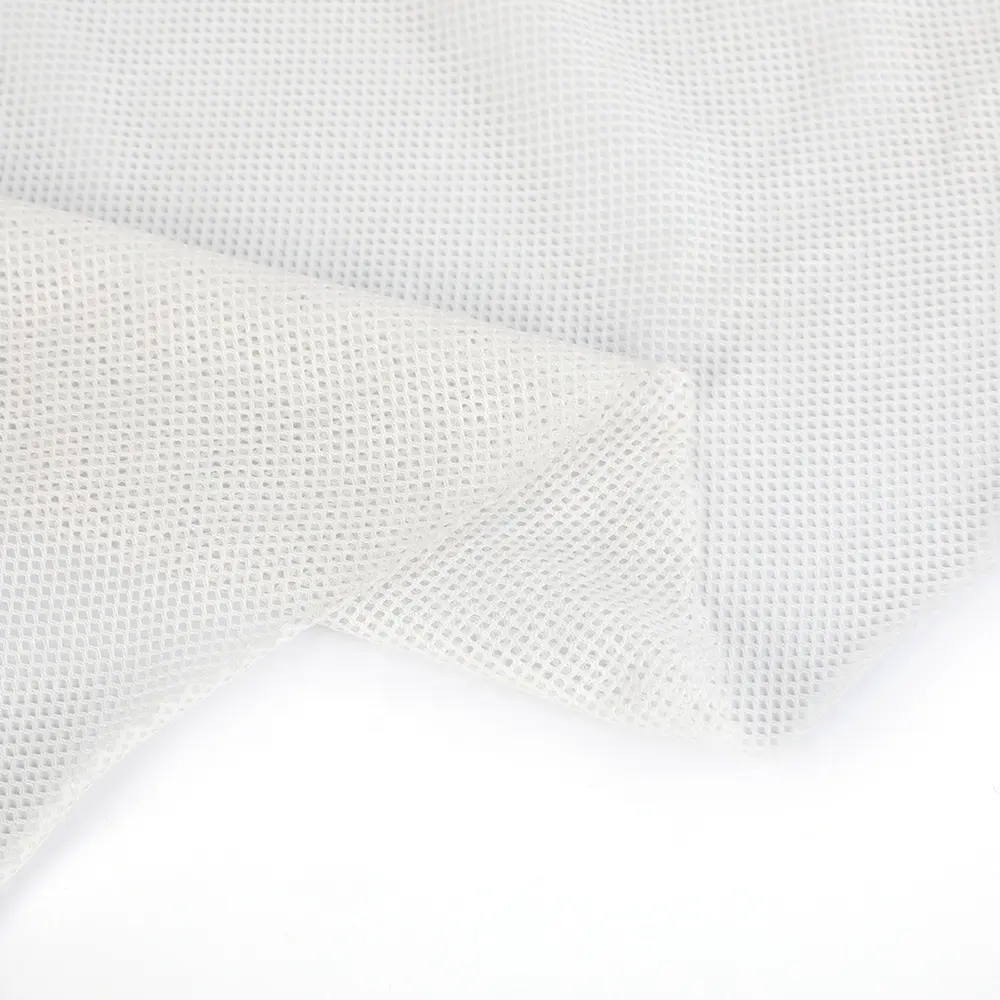 Design populaire 100% polyester colorant solide designer 3d trou air mesh tissu