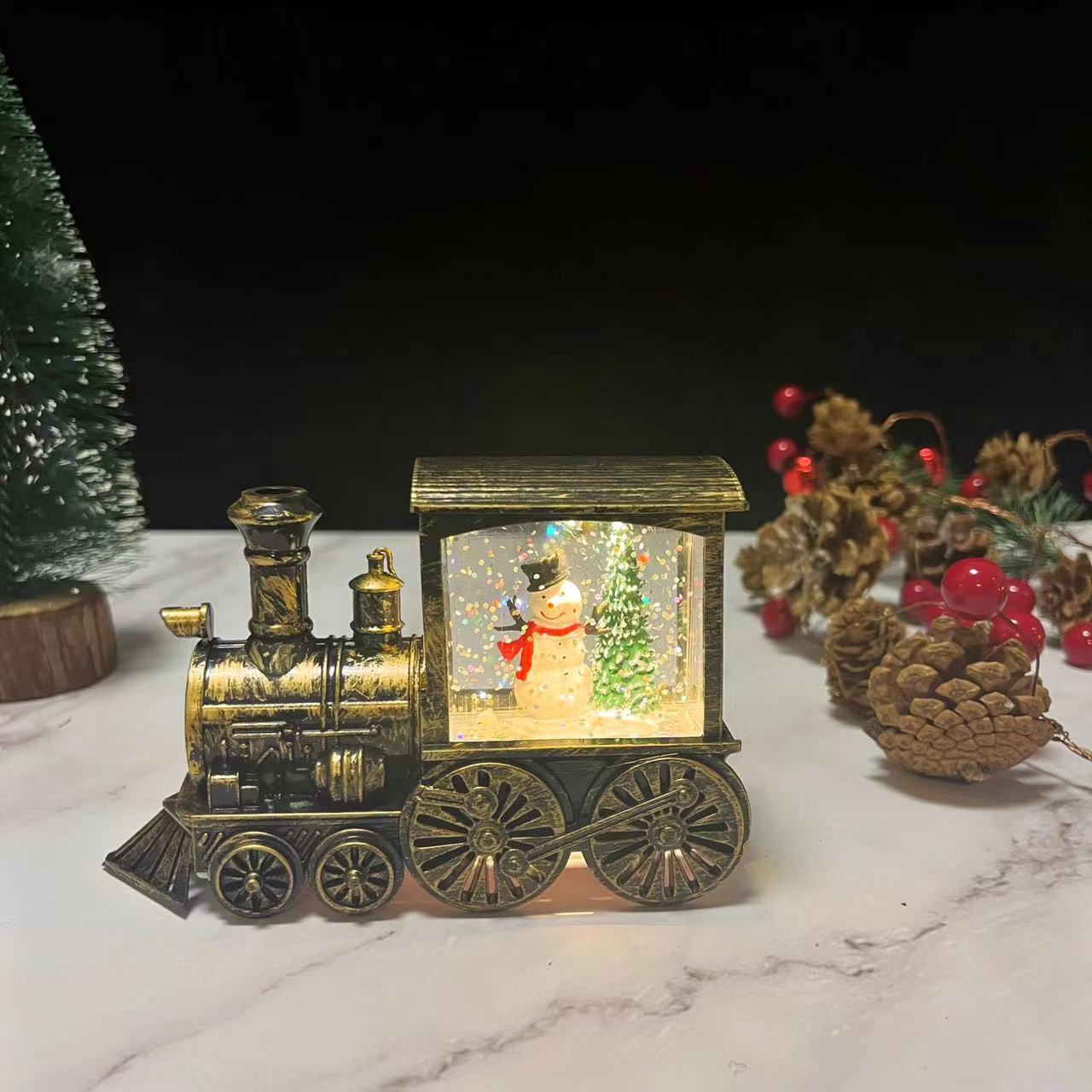 Arbre de bonhomme de neige de train d'eau de brosse d'or