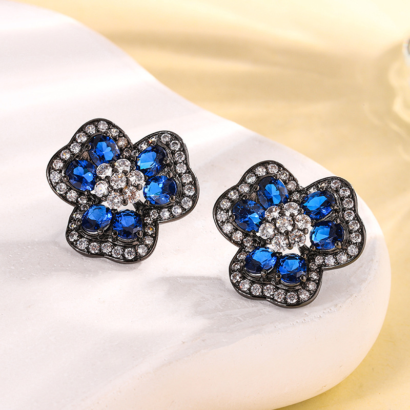 Clous d'oreilles en cristal pointu bleu or noir