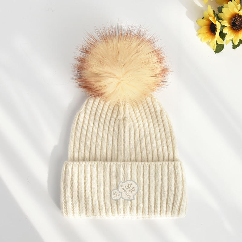 White with beige pom