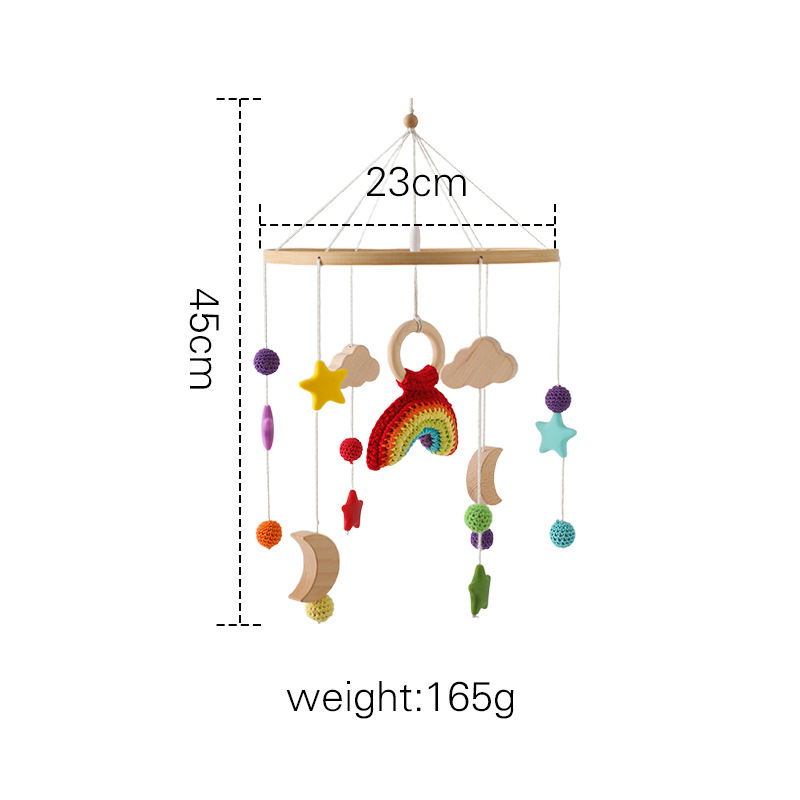 Cloche de lit jouet au crochet arc-en-ciel