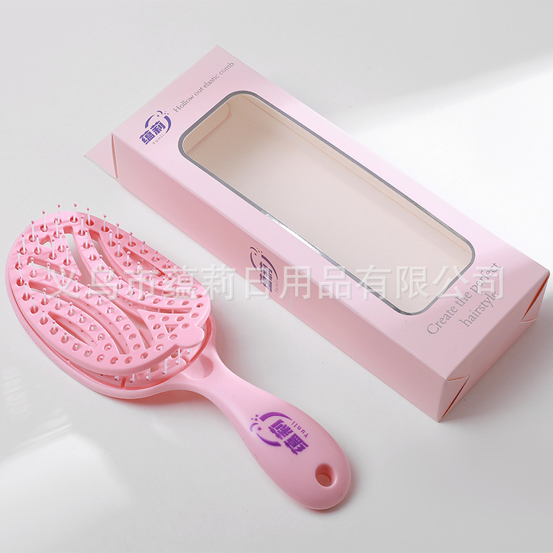 Peigne autonettoyant rose (Pack OPP)