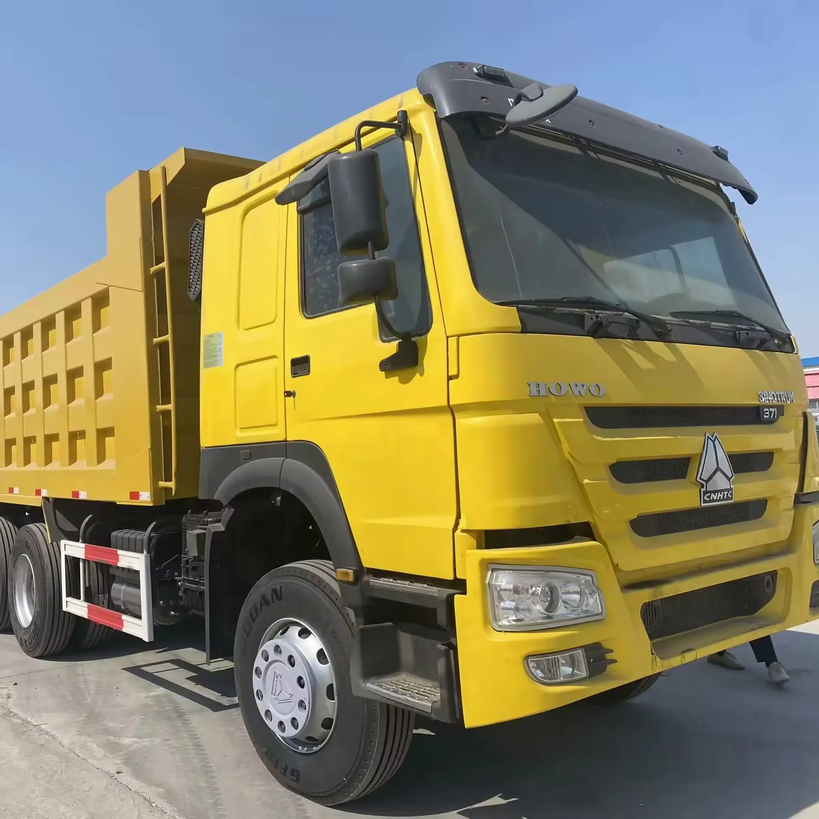 SINOTRUK HOWO 6*4 gebrauchter gelber 10-rädriger dumpwagen hochleistungs-dumpingwagen 371ps ladekapazität 50 tonnen