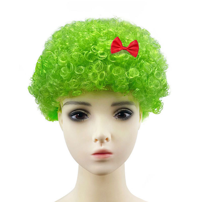 Fans wear green afro-bow tie