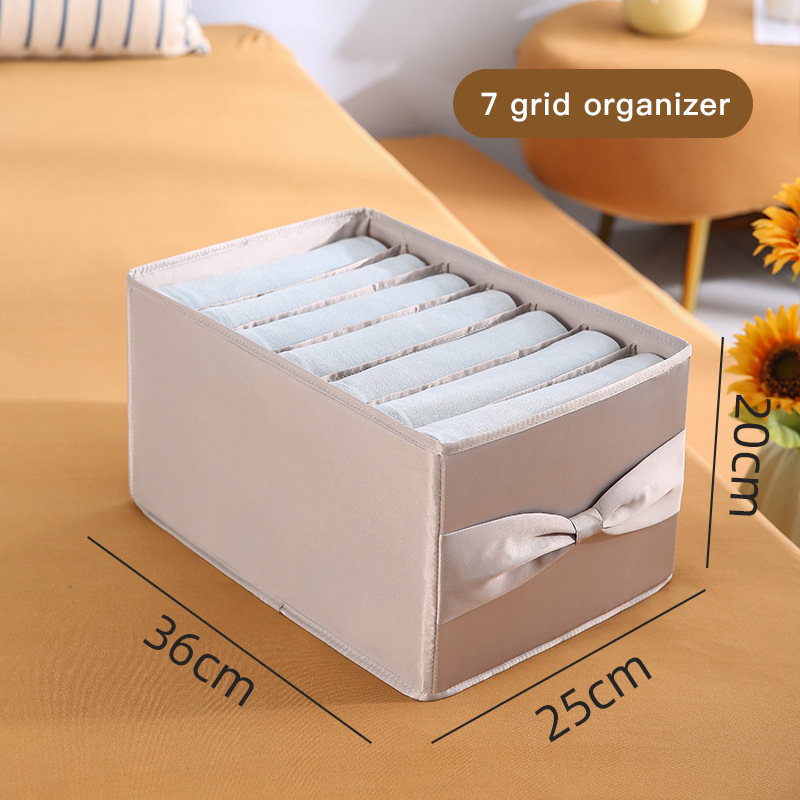 Boîte de rangement grise à 7 compartiments