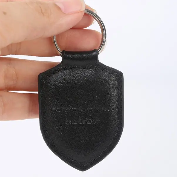 Vente en gros mode pas cher personnalisé Mini voiture Logo personnalisé blanc métal porte-clés porte-clés porte-clés en cuir Pu