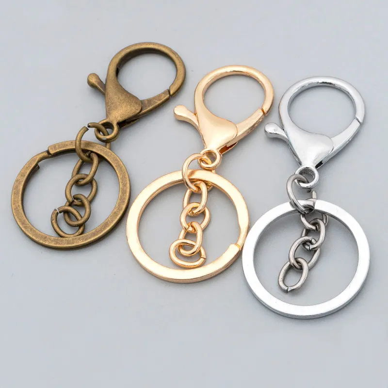High quality zinc alloy stainless steel keychain three piece set Diy pendant gold-plated silver rotating chain key