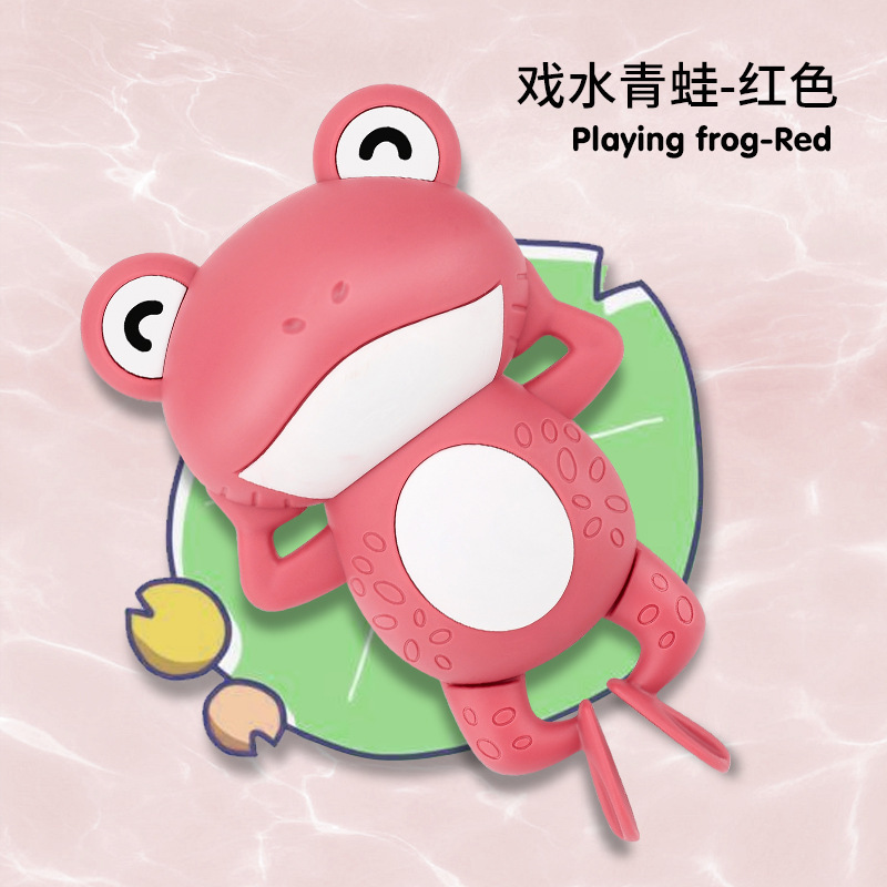 Grenouille joyeuse rouge qui joue dans l'eau