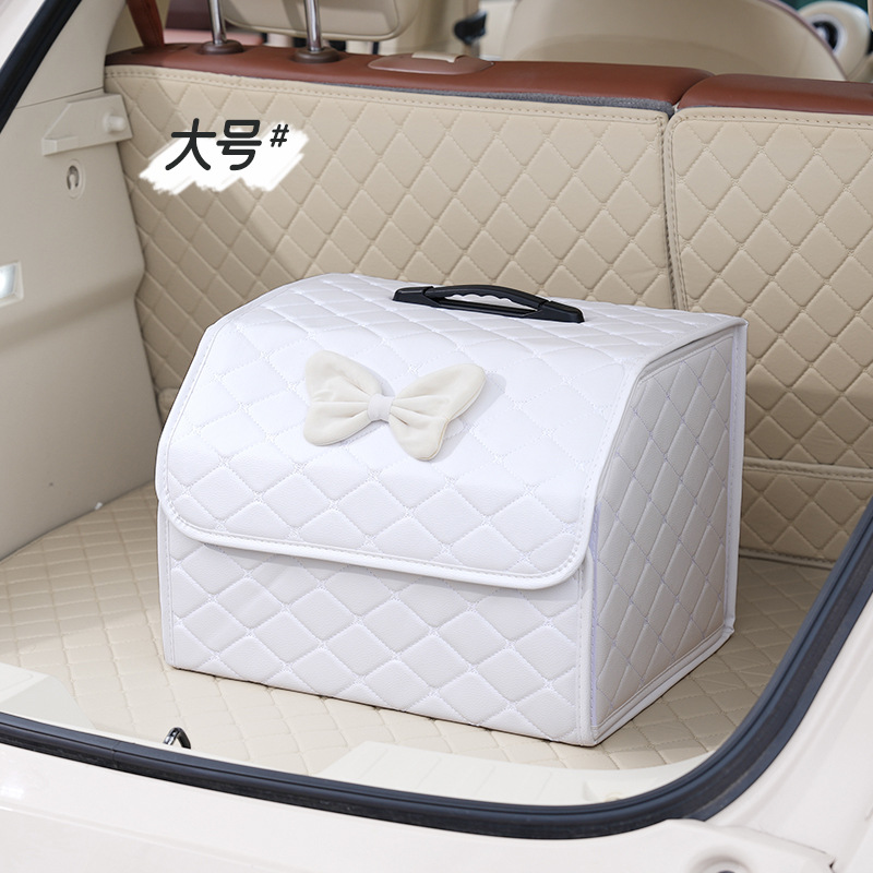 Large folding storage box, white with white velvet bow.