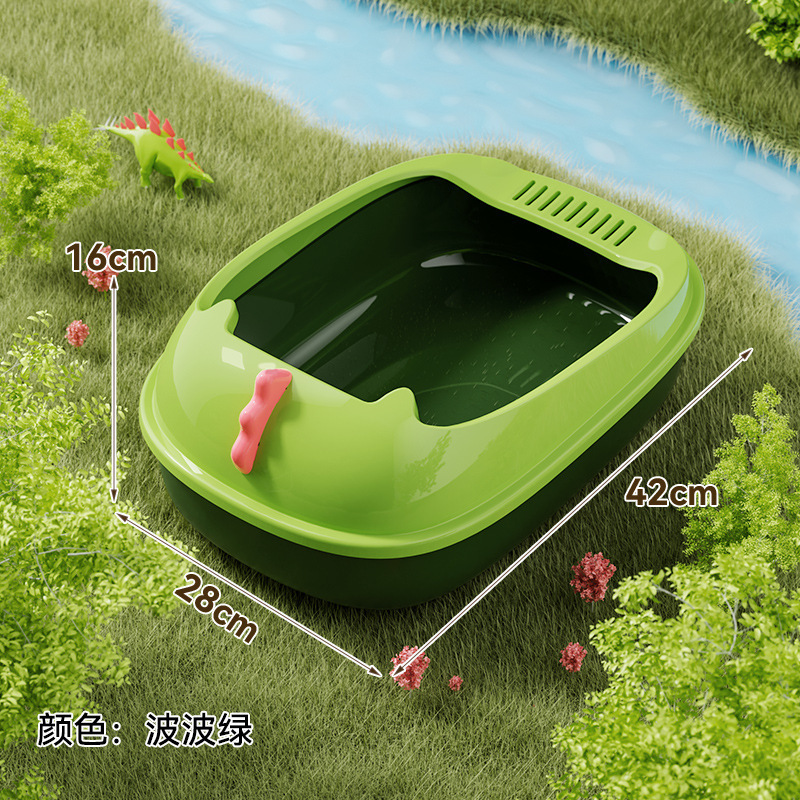 Caja de arena para gatos con forma de dinosaurio verde (incluye pala recogedora).