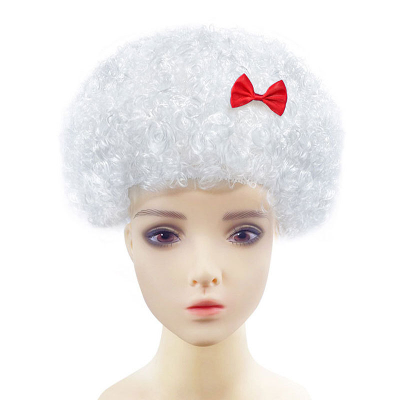 Fans wear white afro-bow tie