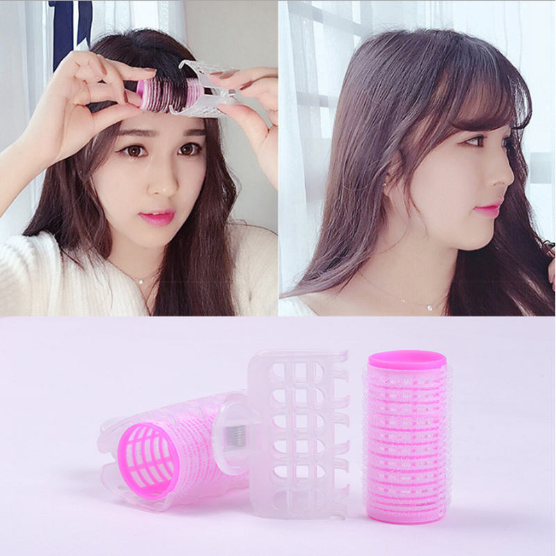 Gros cheveux bouclés roses