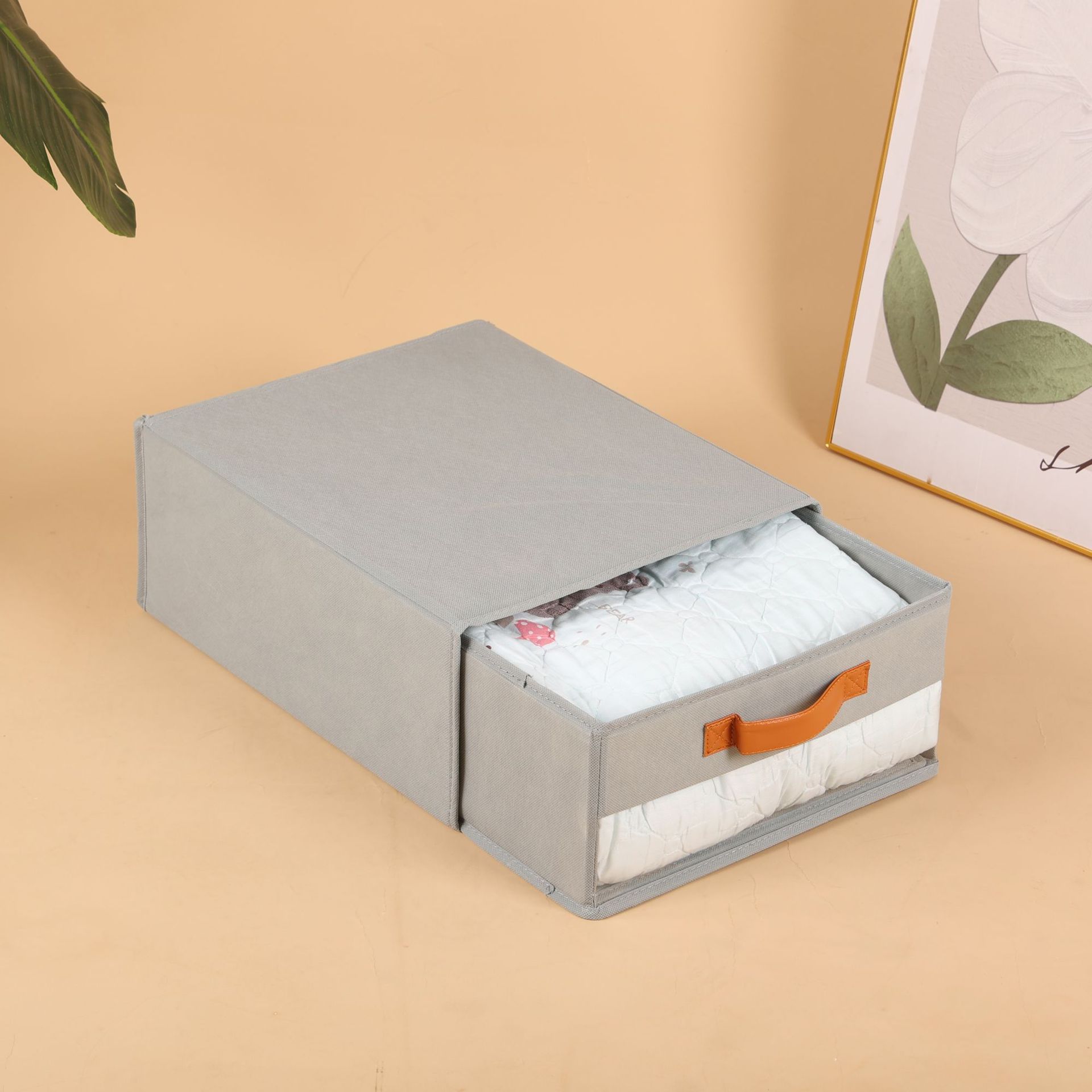 Drawer-style bed sheet storage box with gray leather handle