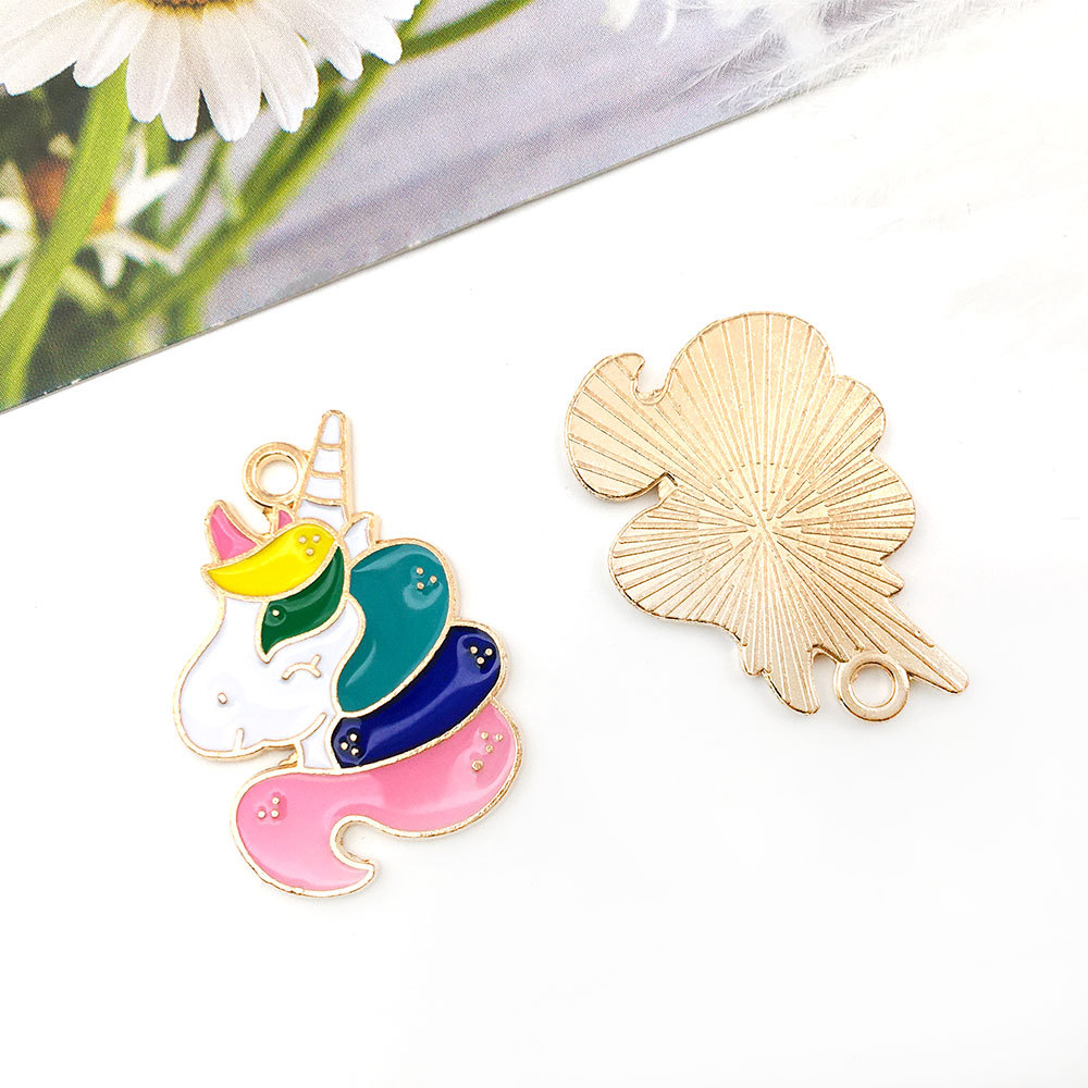Licorne rose 20x27mm-14365