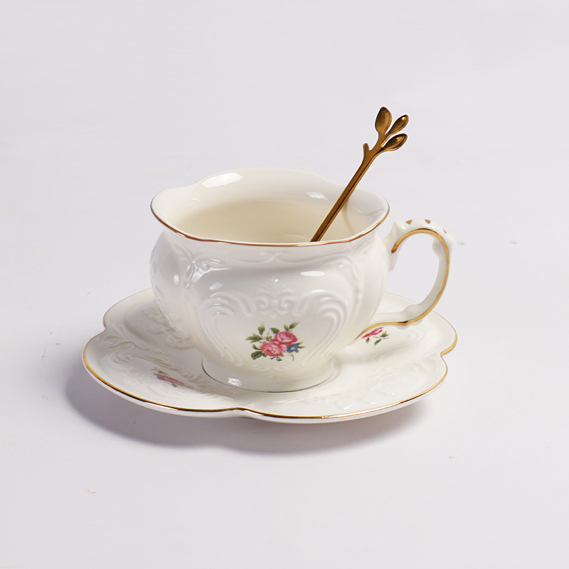 white-cup and saucer