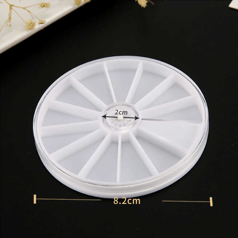 The small round 12-compartment design is non-removable.
