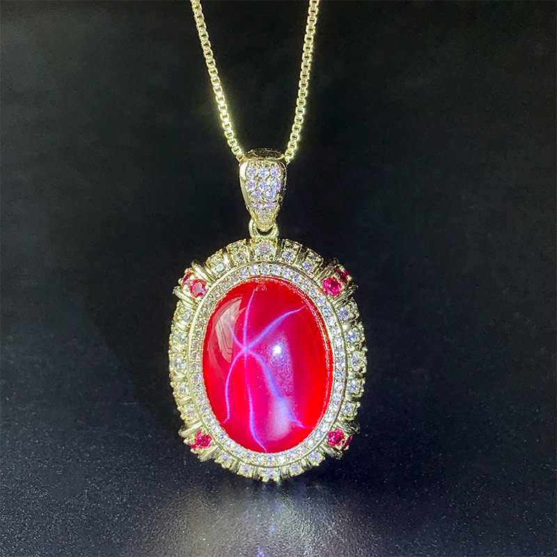 Colgante de luz con estrella de seis puntas de corindón rojo dorado con cadena