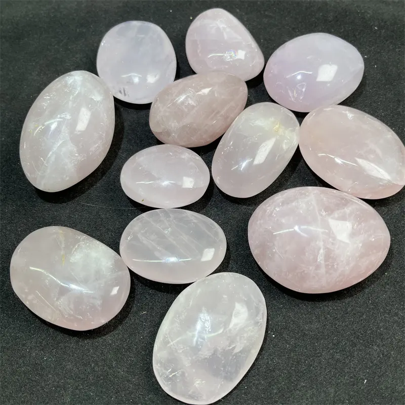 Venta al por mayor de cristal de cuarzo rosa natural piedra caída masaje curativo piedra de Palma