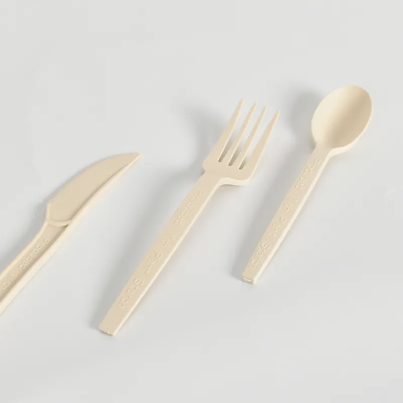 Cuchillo de maíz desechable, tenedor y cuchara, cubiertos de plástico de grado alimenticio, precio directo de fábrica