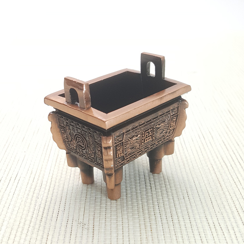 Trípode bronce rojo