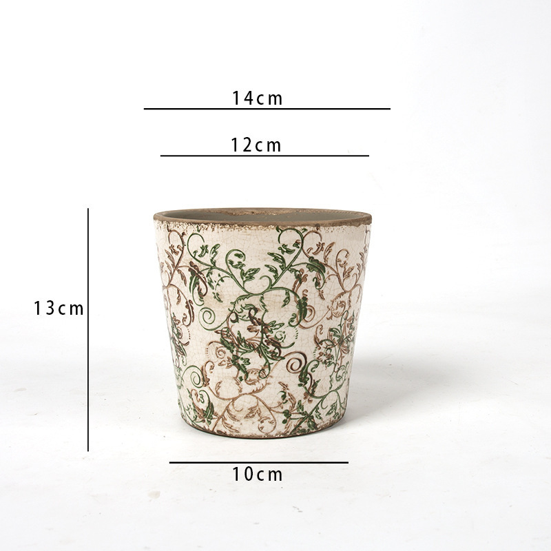 Maceta de vid verde de 1413 cm con orificios de drenaje.